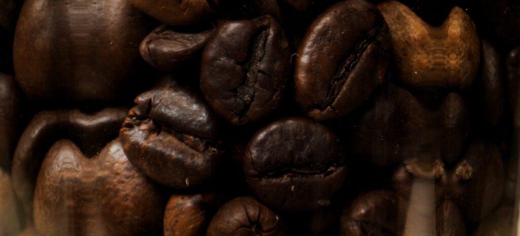 Roasted coffee beans in a glass jar