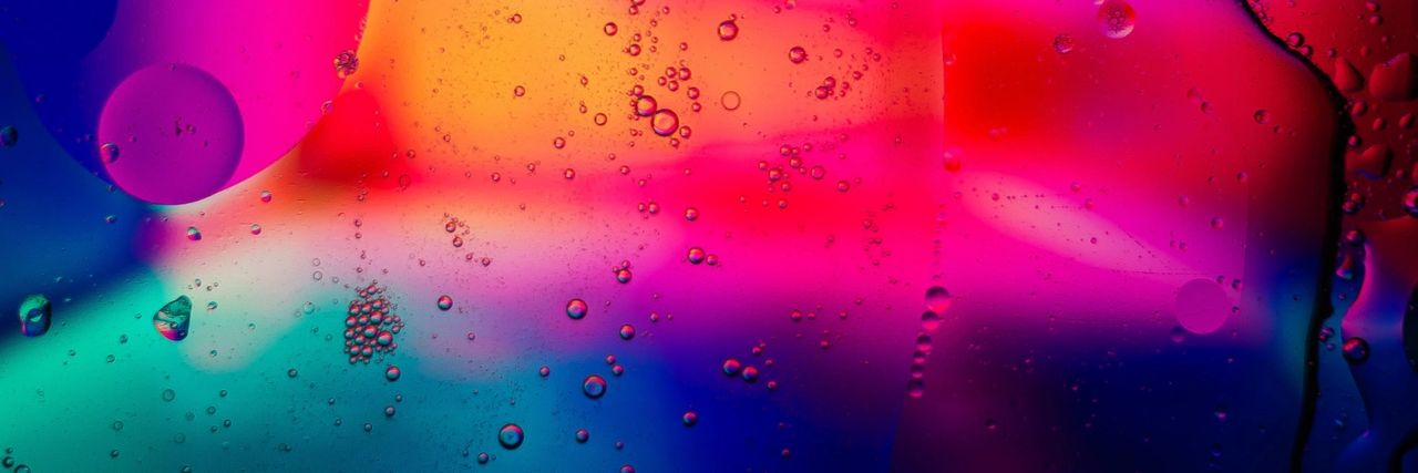 Colorful light defused through transparent liquid 