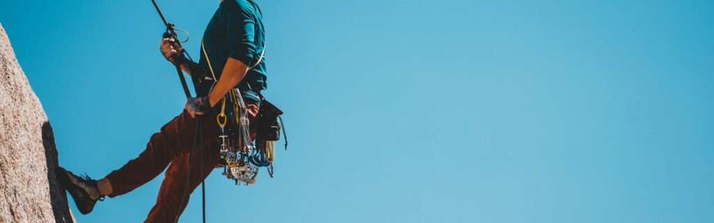 Man with rock climbing gear