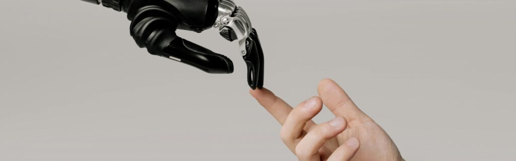 man and AI robot touching